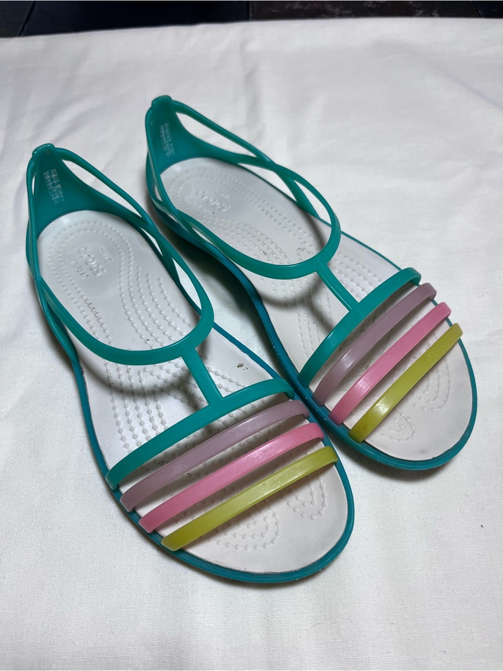 CROCS Teal Jelly Sandals with Light Pink, Medium pink, and Yellow Accent Straps